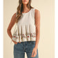 Embroidered Pleated Peplum Top